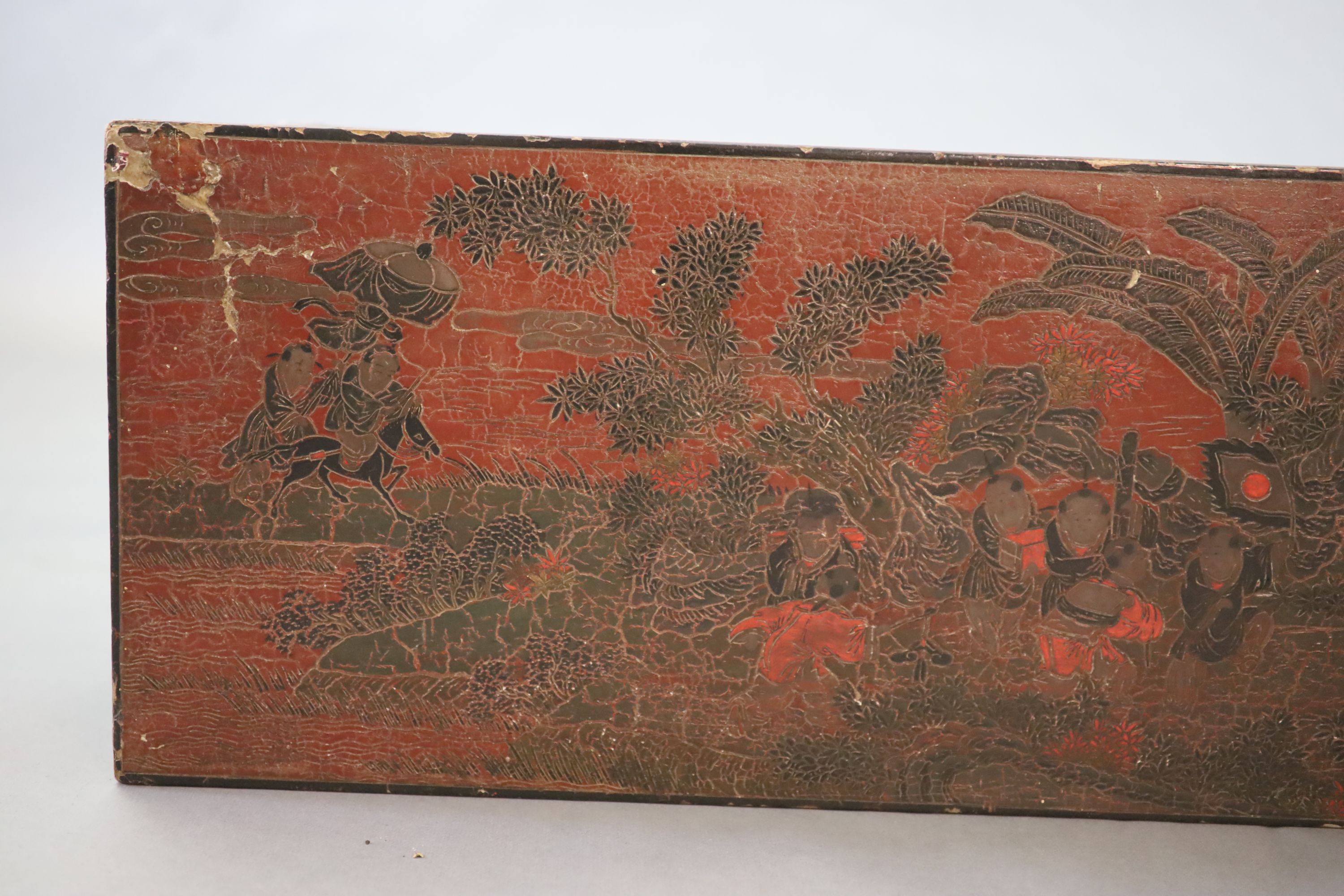 A Chinese coromandel lacquer table or stand, 18th century, 88cm long, 31.5cm long, 35cm high, losses